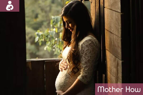 pregnant-women-near-window