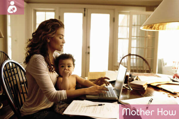 women-with-baby-using-laptop
