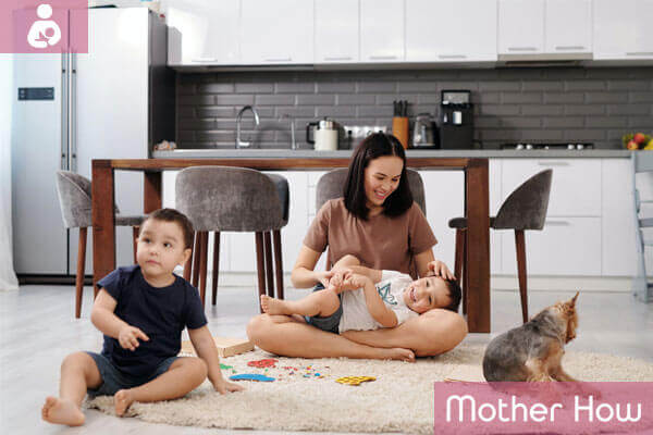 women-playing-with-children