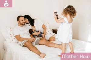 A-little-girl-taking-picture-of-her-family